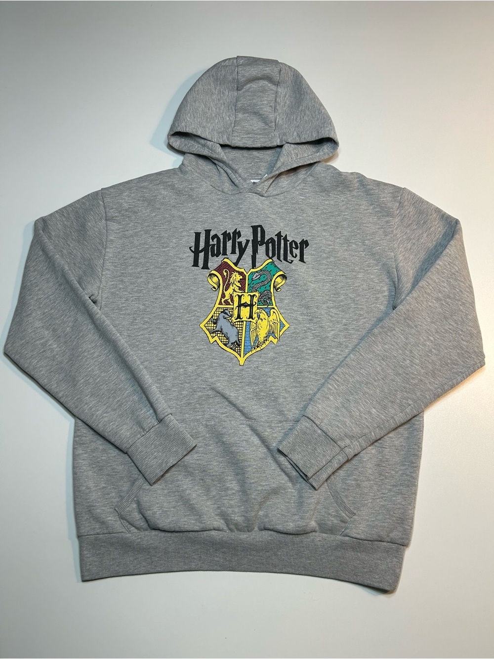 Harry Potter Grey Hogwarts Crest Pullover Hoodie Wizarding World Spellout